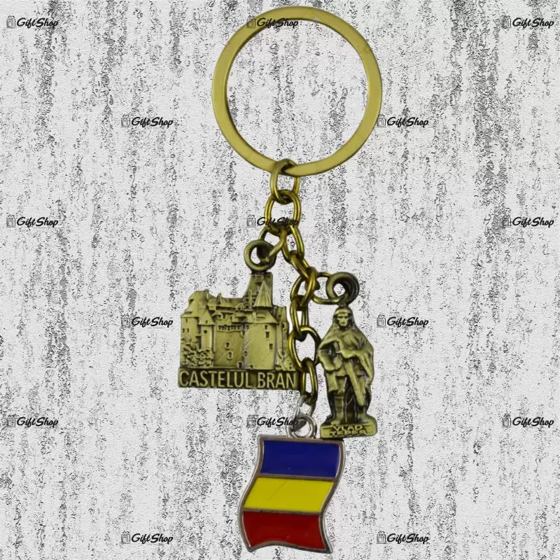 Breloc realizat din metal – design cu castelul bran si steagul romaniei a