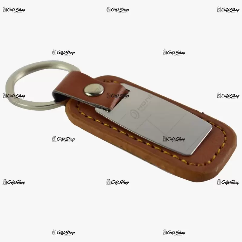 .breloc realizat din inox si piele artificiala - se poate personaliza